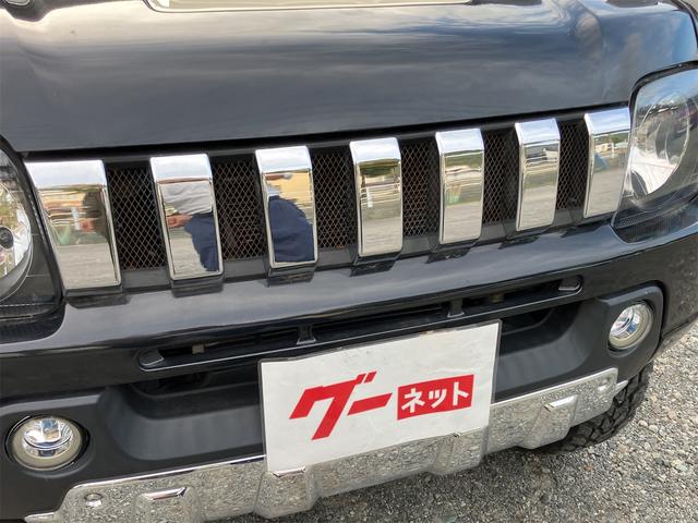 ジムニー クロスアドベンチャー 4WD 5速マニュアル リフトアップ CD/MD ETC シートヒーター キーレスエントリー 衝突安全ボディ 16インチアルミ ライトレベライザー ウインカー付き電動格納ドアミラー メッキグリル(6枚目)