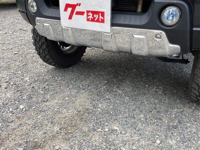 ジムニー クロスアドベンチャー 4WD 5速マニュアル リフトアップ CD/MD ETC シートヒーター キーレスエントリー 衝突安全ボディ 16インチアルミ ライトレベライザー ウインカー付き電動格納ドアミラー メッキグリル(7枚目)