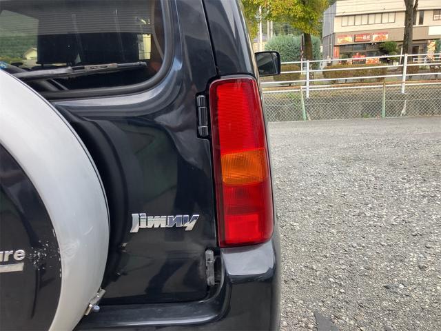 ジムニー クロスアドベンチャー 4WD 5速マニュアル リフトアップ CD/MD ETC シートヒーター キーレスエントリー 衝突安全ボディ 16インチアルミ ライトレベライザー ウインカー付き電動格納ドアミラー メッキグリル(14枚目)