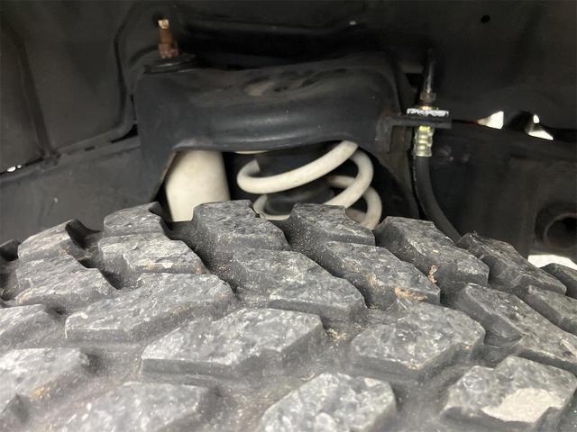 ジムニー クロスアドベンチャー 4WD 5速マニュアル リフトアップ CD/MD ETC シートヒーター キーレスエントリー 衝突安全ボディ 16インチアルミ ライトレベライザー ウインカー付き電動格納ドアミラー メッキグリル(19枚目)