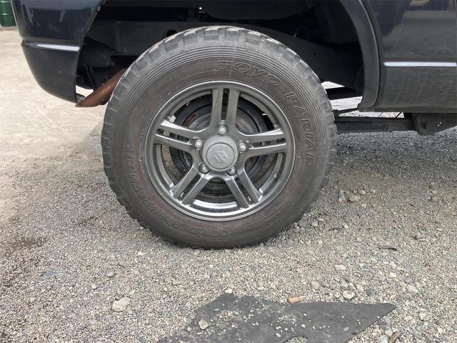 ジムニー クロスアドベンチャー 4WD 5速マニュアル リフトアップ CD/MD ETC シートヒーター キーレスエントリー 衝突安全ボディ 16インチアルミ ライトレベライザー ウインカー付き電動格納ドアミラー メッキグリル(23枚目)