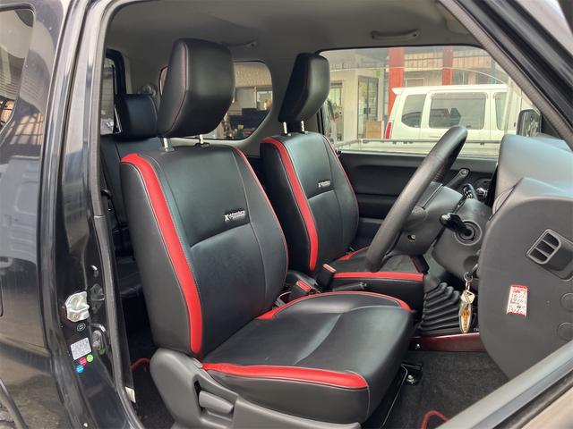 ジムニー クロスアドベンチャー 4WD 5速マニュアル リフトアップ CD/MD ETC シートヒーター キーレスエントリー 衝突安全ボディ 16インチアルミ ライトレベライザー ウインカー付き電動格納ドアミラー メッキグリル(33枚目)