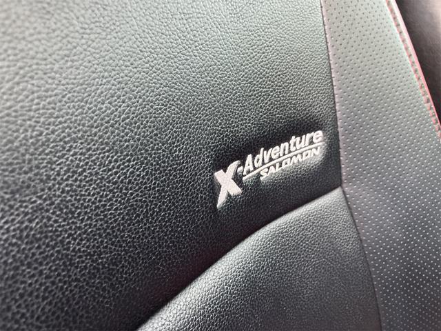 ジムニー クロスアドベンチャー 4WD 5速マニュアル リフトアップ CD/MD ETC シートヒーター キーレスエントリー 衝突安全ボディ 16インチアルミ ライトレベライザー ウインカー付き電動格納ドアミラー メッキグリル(34枚目)