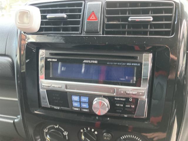 ジムニー クロスアドベンチャー 4WD 5速マニュアル リフトアップ CD/MD ETC シートヒーター キーレスエントリー 衝突安全ボディ 16インチアルミ ライトレベライザー ウインカー付き電動格納ドアミラー メッキグリル(43枚目)