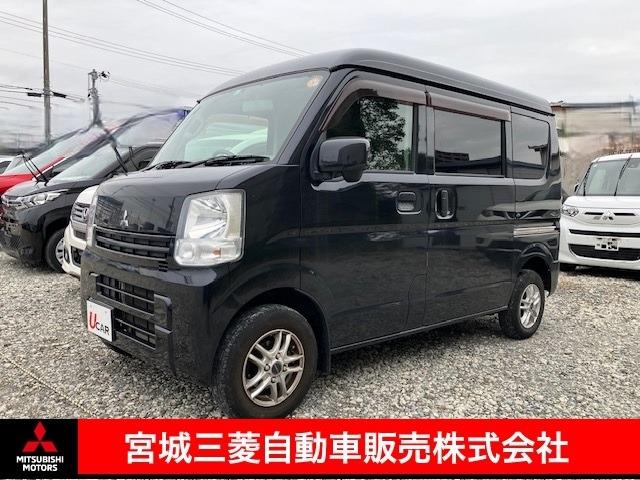 ミニキャブバン(三菱) 【アウトレット中古車！】ブラボー　ハイルーフ　４ＷＤ　キーレスエントリー　Aftermarketナビゲーション　テレビ　両側スライドドア　オーバーヘッドシェルフ　電動格納ドアミラー　パワーウィンドウ　当社下取車両　３ヶ月又は３，０００ｋｍ（いずれか早い方の中古車保証付き） 中古車画像