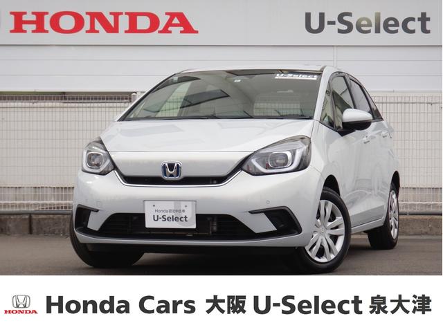 e:HEVホーム ・・当社デモカー 9インチ大画面ナビ・CD録再スマホ連携対応・ バックカメラ ETC 革コンビホワイト内装 障害物センサー 衝突軽減装置 サイド&カーテンエアバック 車間&車線維持クルコン(1枚目)