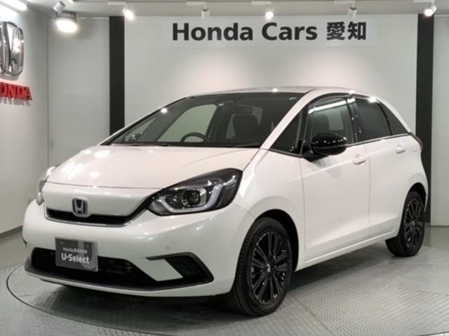 e:HEVホーム20週年特装車/試乗禁煙/プラチナホワイトP 禁煙 新車保証継承 Navi BTaudio ipod/USB接続 CD/フルセグTV リアカメラ ETC LEDライト ステリモ クル-ズCR シ-トH 衝突軽減 サイドSRS 緊急レスキュ-装置(1枚目)