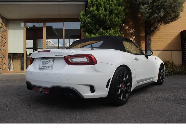 アバルト１２４ スパイダー ベースグレード　６ＭＴ・ナビ・レザーＰＫＧ・タイミングベルト・ＷＰ交換・レコードモンツァ・ローダウンコイル・スロットルコントローラー・エアクリーナー・ボンネットダンパー・カーボンシフトパネル・ホイールスペーサー（15枚目）