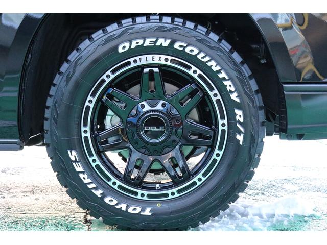 スーパーGL ダークプライムII 4WD/パーキングサポート/床張りフローリング施工/FLEXオリジナルDELF0416AW/Rim TAKUMI GHX ショックアブソーバ/エンジンフードカバー前後/TRD フロントスポイラー(65枚目)