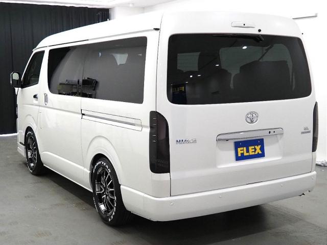 ハイエースワゴン GL ロング ファインテックツアラー ファインテックツアラー 両側パワースライドドア ローダウン FLEXオリジナルカスタムパーツ スポイラー オーバーフェンダー アルミホイール テールランプ シートカバー インテリアパネル アルパイン(6枚目)