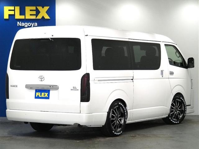 ハイエースワゴン GL ロング ファインテックツアラー ファインテックツアラー 両側パワースライドドア ローダウン FLEXオリジナルカスタムパーツ スポイラー オーバーフェンダー アルミホイール テールランプ シートカバー インテリアパネル アルパイン(7枚目)