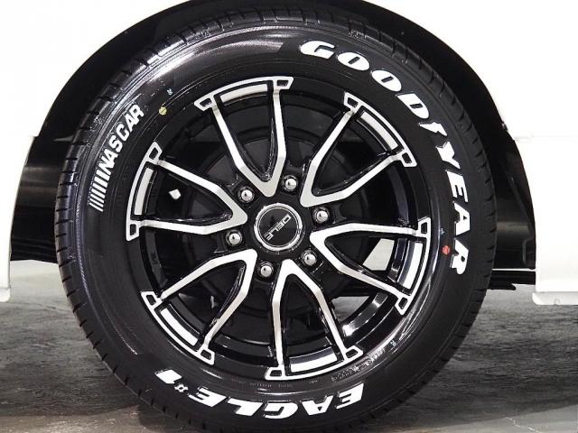 ハイエースワゴン GL ロング ファインテックツアラー ファインテックツアラー 両側パワースライドドア ローダウン FLEXオリジナルカスタムパーツ スポイラー オーバーフェンダー アルミホイール テールランプ シートカバー インテリアパネル アルパイン(9枚目)