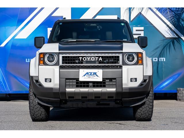 ランドクルーザー250 VX ボディーラッピング エクストリームJ サンルーフ VIPERセキュリティ 社外テールランプ(一文字テール) 社外サイドステップ 黒革シート Wエアコン ルーフレール エクストリーム18インチAW(10枚目)