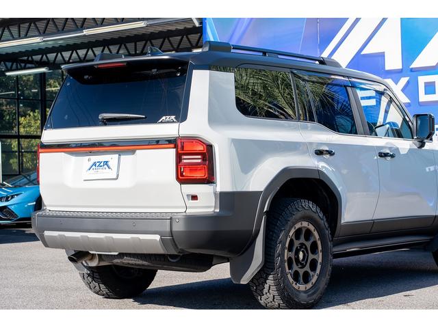 ランドクルーザー250 VX ボディーラッピング エクストリームJ サンルーフ VIPERセキュリティ 社外テールランプ(一文字テール) 社外サイドステップ 黒革シート Wエアコン ルーフレール エクストリーム18インチAW(11枚目)