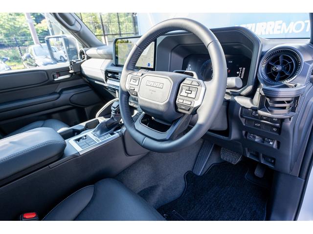 ランドクルーザー250 VX ボディーラッピング エクストリームJ サンルーフ VIPERセキュリティ 社外テールランプ(一文字テール) 社外サイドステップ 黒革シート Wエアコン ルーフレール エクストリーム18インチAW(13枚目)