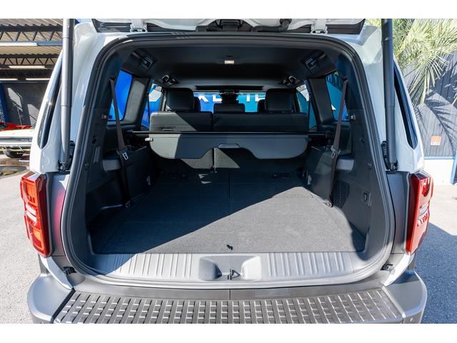 ランドクルーザー250 VX ボディーラッピング エクストリームJ サンルーフ VIPERセキュリティ 社外テールランプ(一文字テール) 社外サイドステップ 黒革シート Wエアコン ルーフレール エクストリーム18インチAW(19枚目)