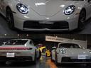 ローン特別2.4% 1オナ 992.2後期 新車保証OP363 トリュフブラウン革/木目パルダオインテリアP スポクロ スポエグ PASM フロントリフティング カレラS20/21AW 車庫保管 禁煙(64枚目)