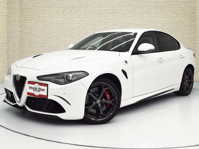 ジュリア クアドリフォリオ　２．９Ｖ　Ｖ６　ビターボ　１９ｉｎＡＷ　カーボンＦスポイラーリップ／サイドスカート／トランクスポイラー　カーボンエンジンフード　ブラックハーフレザー　ＦシートＨ　カーボンパネル　ハーマンカードン　ステアリングＨ　ＡＣＣ（3枚目）