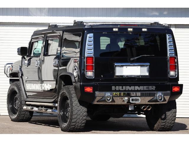 ハマーH2 ラグジュアリーパッケージ 後期モデル バネサス変更済み 3列シート ジオバンナ20AW メッキグリルガード メッキパーツカスタム サイドステップ LEDヘッドライト イルミネーション 黒革シート 社外ナビ(2枚目)