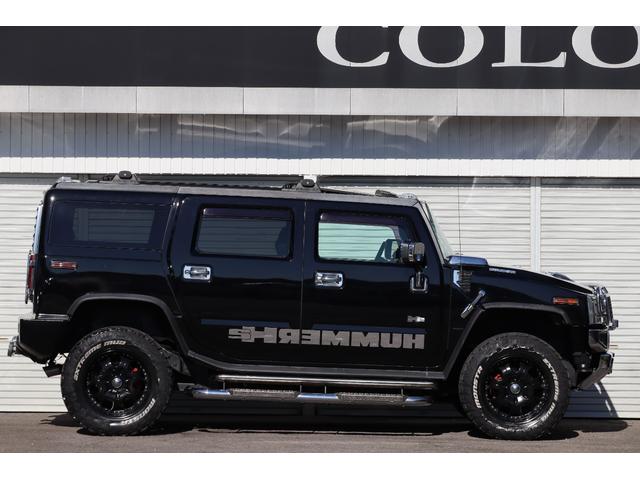 ハマーH2 ラグジュアリーパッケージ 後期モデル バネサス変更済み 3列シート ジオバンナ20AW メッキグリルガード メッキパーツカスタム サイドステップ LEDヘッドライト イルミネーション 黒革シート 社外ナビ(10枚目)