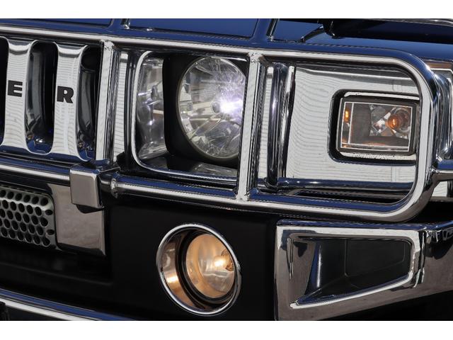 ハマーH2 ラグジュアリーパッケージ 後期モデル バネサス変更済み 3列シート ジオバンナ20AW メッキグリルガード メッキパーツカスタム サイドステップ LEDヘッドライト イルミネーション 黒革シート 社外ナビ(18枚目)