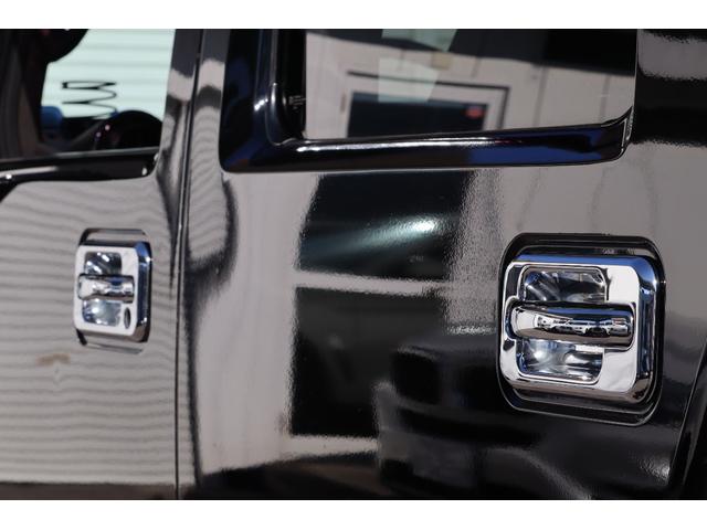 ハマーH2 ラグジュアリーパッケージ 後期モデル バネサス変更済み 3列シート ジオバンナ20AW メッキグリルガード メッキパーツカスタム サイドステップ LEDヘッドライト イルミネーション 黒革シート 社外ナビ(20枚目)