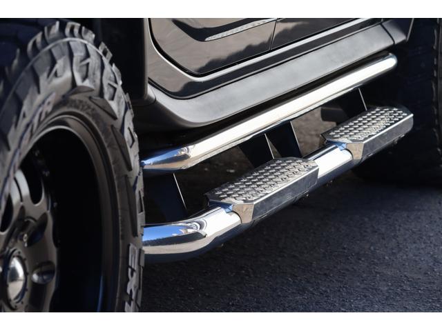 ハマーH2 ラグジュアリーパッケージ 後期モデル バネサス変更済み 3列シート ジオバンナ20AW メッキグリルガード メッキパーツカスタム サイドステップ LEDヘッドライト イルミネーション 黒革シート 社外ナビ(21枚目)