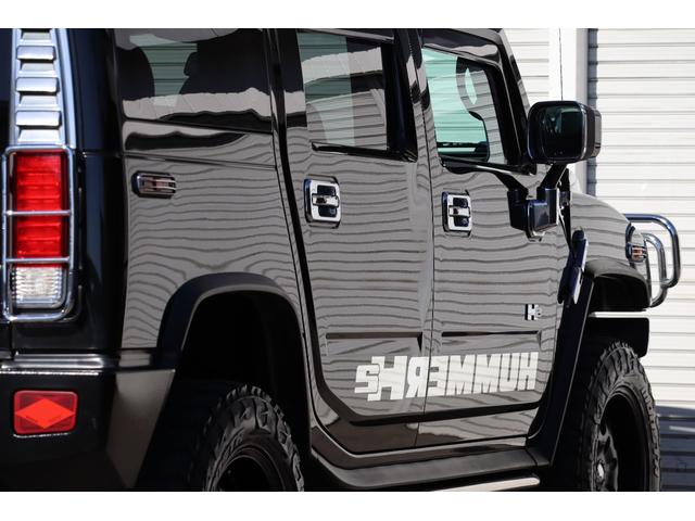 ハマーH2 ラグジュアリーパッケージ 後期モデル バネサス変更済み 3列シート ジオバンナ20AW メッキグリルガード メッキパーツカスタム サイドステップ LEDヘッドライト イルミネーション 黒革シート 社外ナビ(24枚目)