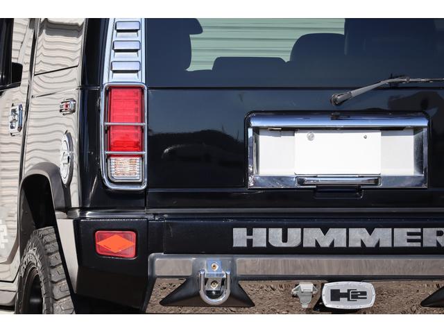 ハマーH2 ラグジュアリーパッケージ 後期モデル バネサス変更済み 3列シート ジオバンナ20AW メッキグリルガード メッキパーツカスタム サイドステップ LEDヘッドライト イルミネーション 黒革シート 社外ナビ(26枚目)