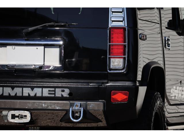 ハマーH2 ラグジュアリーパッケージ 後期モデル バネサス変更済み 3列シート ジオバンナ20AW メッキグリルガード メッキパーツカスタム サイドステップ LEDヘッドライト イルミネーション 黒革シート 社外ナビ(27枚目)