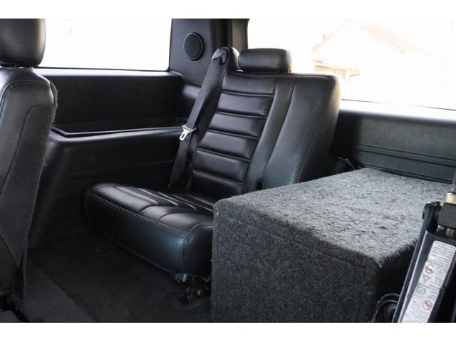 ハマーH2 ラグジュアリーパッケージ 後期モデル バネサス変更済み 3列シート ジオバンナ20AW メッキグリルガード メッキパーツカスタム サイドステップ LEDヘッドライト イルミネーション 黒革シート 社外ナビ(40枚目)