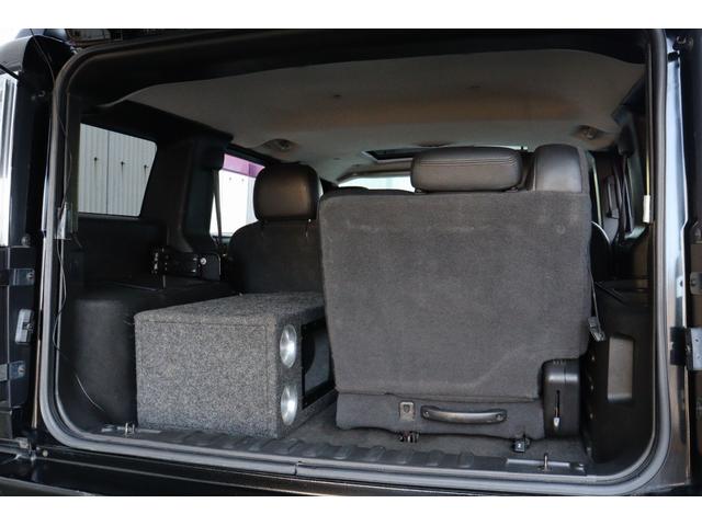 ハマーH2 ラグジュアリーパッケージ 後期モデル バネサス変更済み 3列シート ジオバンナ20AW メッキグリルガード メッキパーツカスタム サイドステップ LEDヘッドライト イルミネーション 黒革シート 社外ナビ(45枚目)