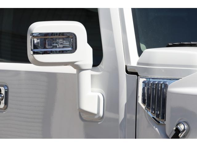 ハマーＨ２ アドベンチャーパッケージ　ラグジュアリーパッケージ　１ナンバー登録　セカンドキャプテンシート　社外エアロ　メッキパーツ　サイドステップ　２４インチＡＷ　社外ナビ　同色パーツカスタム　サンルーフ（18枚目）