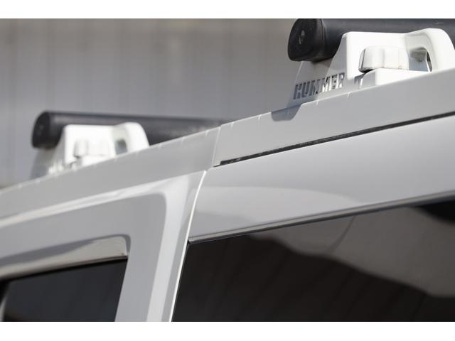 ハマーＨ２ アドベンチャーパッケージ　ラグジュアリーパッケージ　１ナンバー登録　セカンドキャプテンシート　社外エアロ　メッキパーツ　サイドステップ　２４インチＡＷ　社外ナビ　同色パーツカスタム　サンルーフ（23枚目）