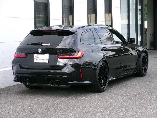 Ｍ３ Ｍ３ツーリング　コンペティション　Ｍ　ｘＤｒｉｖｅ　ＭコンフォートＰＫＧ　エクステンドメリノフィオナレッド革　カーブドディスプレイ　ハーマンカードン　サンプロテクションガラス　オートトランク　禁煙　１オーナー　認定中古車（3枚目）