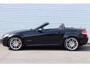 SLK200コンプレッサー スポーツED 250台限定車・特別仕様・電動オープン・エアスカーフ・シートヒーター・レッドシートベルト・Rスポイラー・専用18インチAW・レッドステッチ黒革シート・レッドキャリパー仕様・車幅センサー・HIDライト(30枚目)