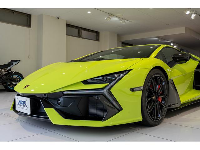 レヴエルト ベースグレード　シャイニーカーボンパッケージ　正規ディーラー車　ボディカラー　Ｖｅｒｄｅ　Ｓｃａｎｄａｌ　リアディフューザー・ストライプ　エアロドアフィン（シャイニーカーボン）　インテリアカーボンディテールパッケージ（10枚目）