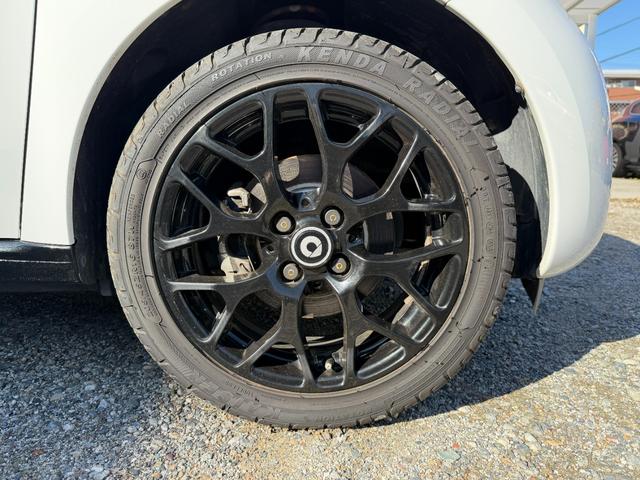 スマートフォーフォー ターボ 半年保証付 禁煙車 レザーシート ガラスルーフ ナビ 地デジ バックモニター キーレス 純正16インチアルミ シートヒーター 衝突軽減システム アイドリングストップ ドライブレコーダー ETC(49枚目)