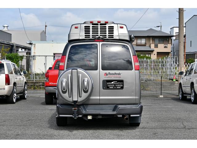 シボレーエクスプレス  ロードトレック170 ヴァーサタイル 2011年モデル 実走行証明書 オートチェック&カーFAX ジェネレーター エアコン 冷蔵庫 電子レンジ 2口コンロ サイドオーニング シンク 電動ソファーベッド(10枚目)