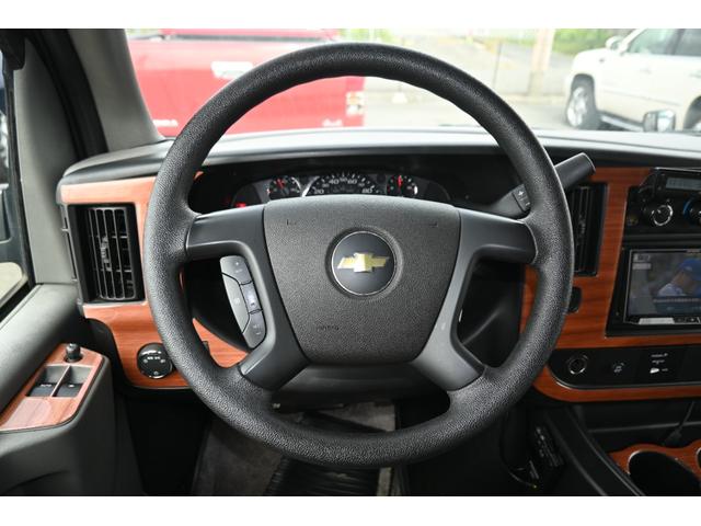 シボレーエクスプレス  ロードトレック170 ヴァーサタイル 2011年モデル 実走行証明書 オートチェック&カーFAX ジェネレーター エアコン 冷蔵庫 電子レンジ 2口コンロ サイドオーニング シンク 電動ソファーベッド(38枚目)