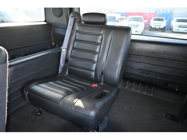 ハマーＨ２ タイプＧ　２００５ｙモデル　正規ディーラー車　実走行　サンルーフ　黒本革シート　ＬＵＸＸＸクローム２６インチホイール新品　３１５／４０Ｒ２６タイヤ新品　ガナドール４本出しマフラー　シートヒーター＆パワーシート（15枚目）