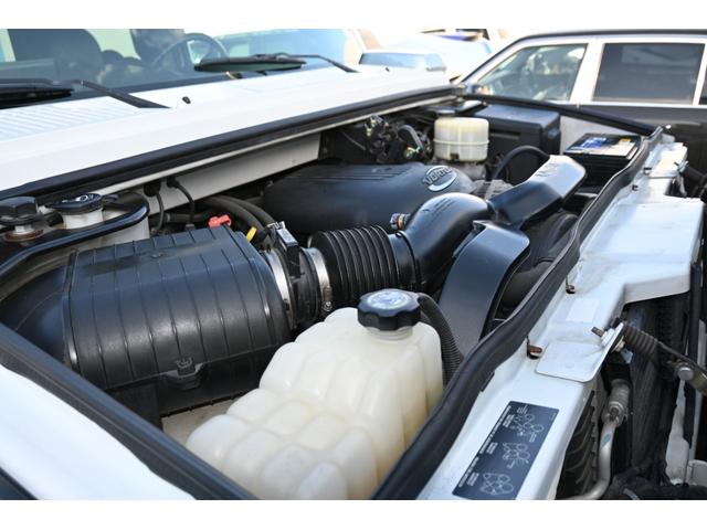 ハマーＨ２ タイプＧ　２００５ｙモデル　正規ディーラー車　実走行　サンルーフ　黒本革シート　ＬＵＸＸＸクローム２６インチホイール新品　３１５／４０Ｒ２６タイヤ新品　ガナドール４本出しマフラー　シートヒーター＆パワーシート（22枚目）