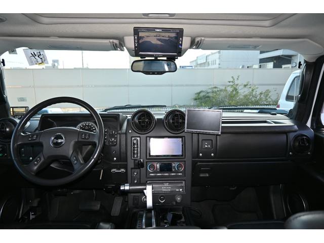 ハマーＨ２ タイプＧ　２００５ｙモデル　正規ディーラー車　実走行　サンルーフ　黒本革シート　ＬＵＸＸＸクローム２６インチホイール新品　３１５／４０Ｒ２６タイヤ新品　ガナドール４本出しマフラー　シートヒーター＆パワーシート（24枚目）