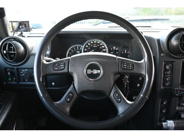 ハマーＨ２ タイプＧ　２００５ｙモデル　正規ディーラー車　実走行　サンルーフ　黒本革シート　ＬＵＸＸＸクローム２６インチホイール新品　３１５／４０Ｒ２６タイヤ新品　ガナドール４本出しマフラー　シートヒーター＆パワーシート（26枚目）