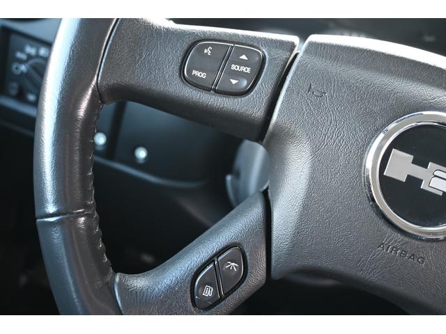 ハマーＨ２ タイプＧ　２００５ｙモデル　正規ディーラー車　実走行　サンルーフ　黒本革シート　ＬＵＸＸＸクローム２６インチホイール新品　３１５／４０Ｒ２６タイヤ新品　ガナドール４本出しマフラー　シートヒーター＆パワーシート（28枚目）