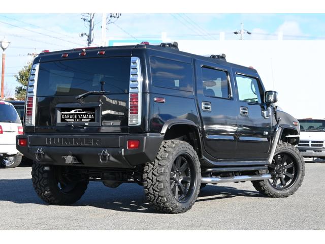 ハマーＨ２ ラグジュアリーパッケージ　２００６ｙモデル　新車並行　実走行証明書付　サンルーフ　黒本革シート　ＭＥＴＨＯＤ２０インチホイール　３５ｘ１２．５０Ｒ２０マッドタイヤ　１ナンバー車検　ＢＯＳＥサウンド　ナビＴＶ　サードシート付（6枚目）