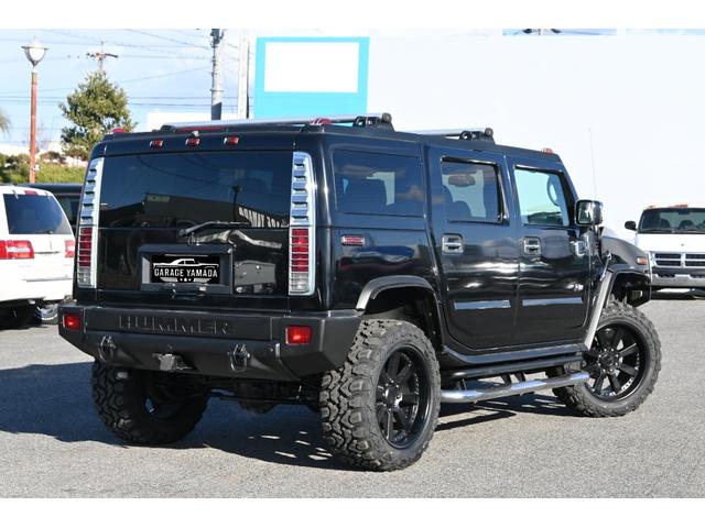 ハマーＨ２ ラグジュアリーパッケージ　２００６ｙモデル　新車並行　実走行証明書付　サンルーフ　黒本革シート　ＭＥＴＨＯＤ２０インチホイール　３５ｘ１２．５０Ｒ２０マッドタイヤ　１ナンバー車検　ＢＯＳＥサウンド　ナビＴＶ　サードシート付（7枚目）