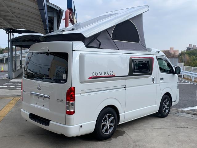 ハイエースバン ＳロングワイドＤＸ　ＧＬパッケージ　ハイエースキャンパー／ホワイトハウスキャンパー製／ＦＲＰオリジナＰＯＰ　ＵＰルーフ＆テント／ギャレー／４０Ｌ冷蔵庫／カセットコンロ＆コンパクトシンク／ＣＴＥＫ昇圧走行充電システム／フライスクリーン（6枚目）