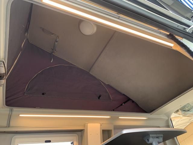 ハイエースバン ＳロングワイドＤＸ　ＧＬパッケージ　ハイエースキャンパー／ホワイトハウスキャンパー製／ＦＲＰオリジナＰＯＰ　ＵＰルーフ＆テント／ギャレー／４０Ｌ冷蔵庫／カセットコンロ＆コンパクトシンク／ＣＴＥＫ昇圧走行充電システム／フライスクリーン（17枚目）