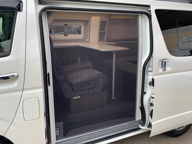 ハイエースバン ＳロングワイドＤＸ　ＧＬパッケージ　ハイエースキャンパー／ホワイトハウスキャンパー製／ＦＲＰオリジナＰＯＰ　ＵＰルーフ＆テント／ギャレー／４０Ｌ冷蔵庫／カセットコンロ＆コンパクトシンク／ＣＴＥＫ昇圧走行充電システム／フライスクリーン（35枚目）